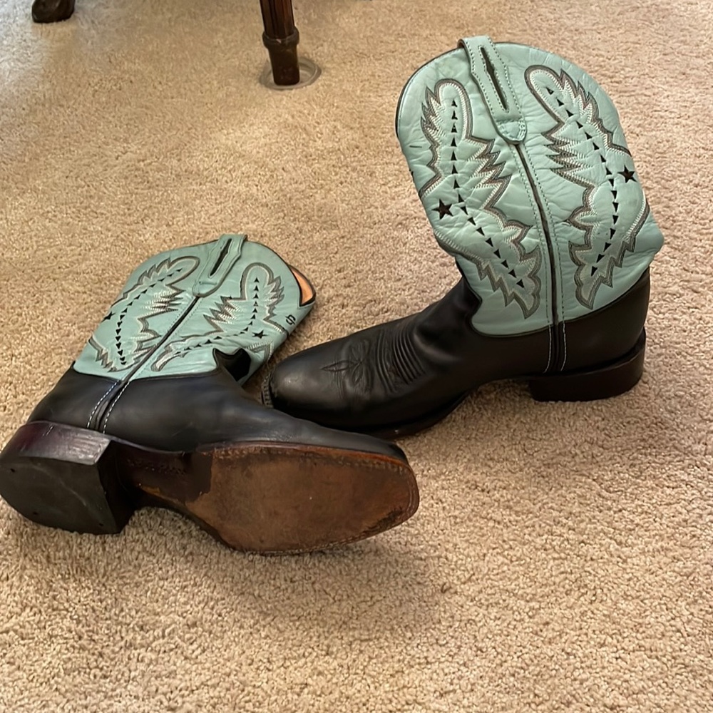 Men’s boots. The brand is Stetson and they are a turquoise top and black bottom.